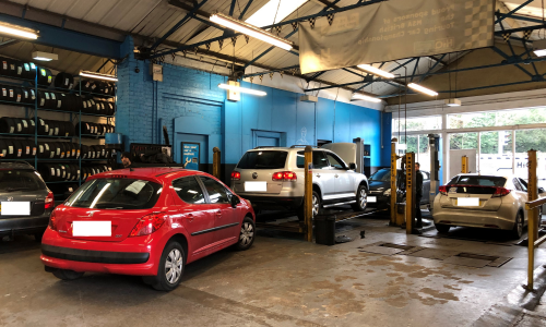 HiQ Rushden cars in workshop
