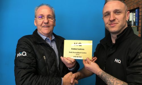 HiQ Somercotes- Shaun Doyle receiving their Gold Standard Award 2018