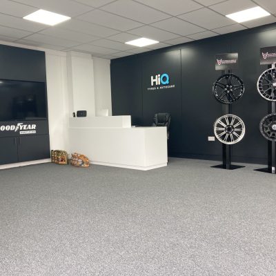 HiQ Tyres Autocare Aylesbury waiting area with tyre stand