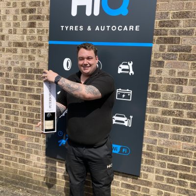 Hi Q Tyres Autocare Peterborough Maskew Centre manager with bottle 2