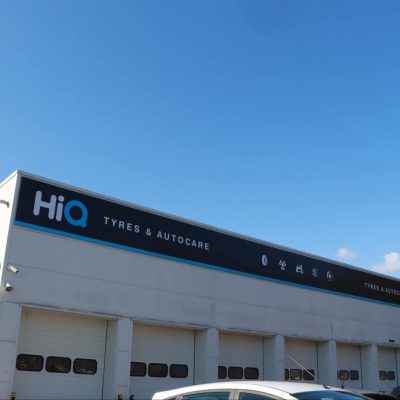 Hi Q Halesowen exterior sky shot with Hi Q Carsa sign