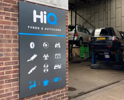 Hi Q Tyres Autocare Haywards Heath sign and workshop