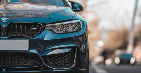 BMW MW Black Car driving on the roads